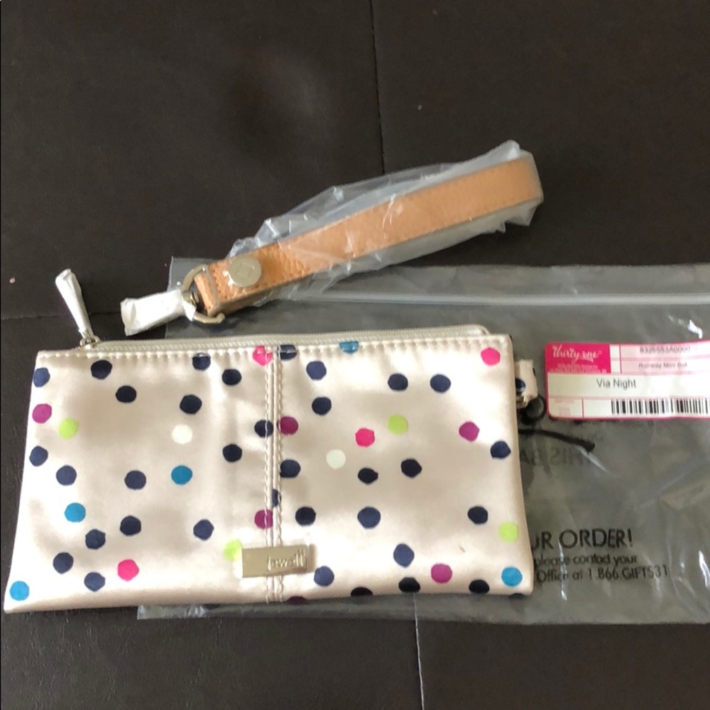 thirty one via night wristlet